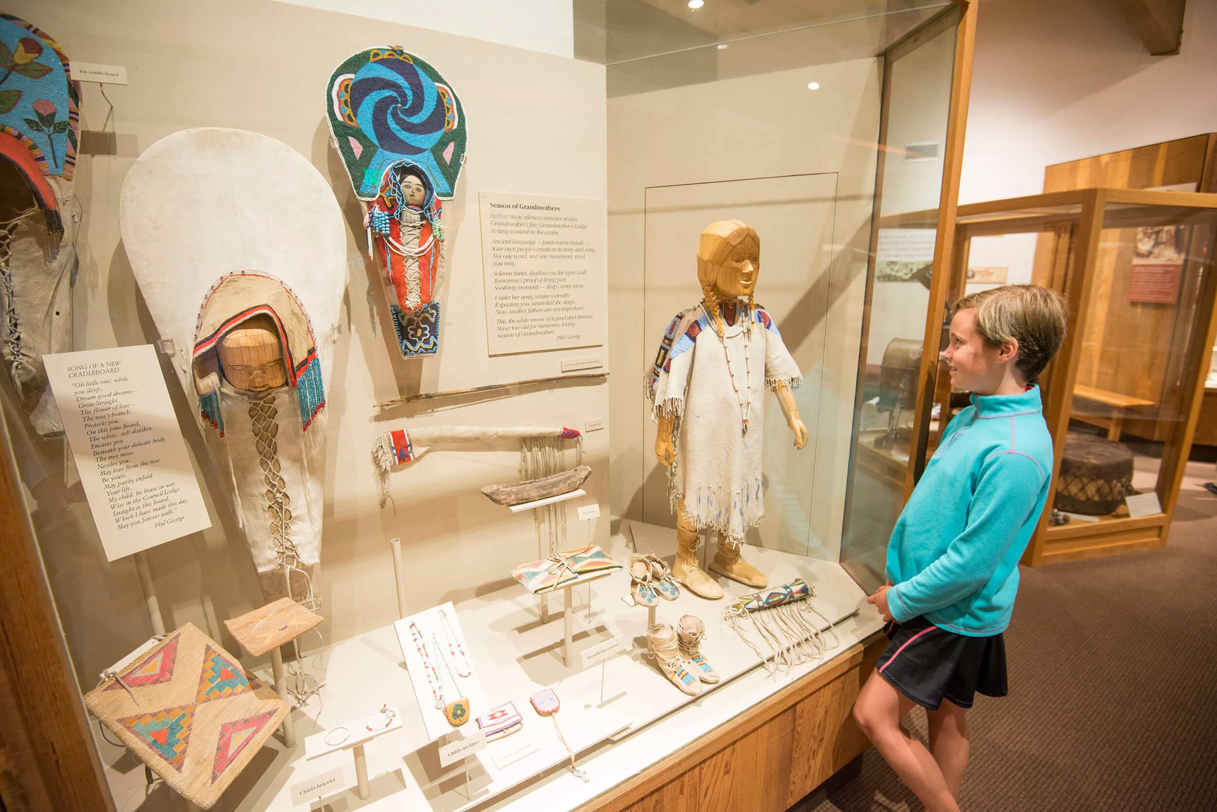 A child looks at an exhibit at the Nez Perce National Historical Park Visitor Center.
