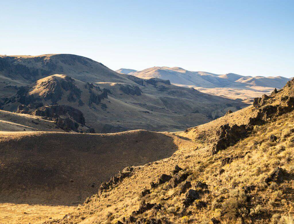 A scenic shot of the rolling Owyhee Mountains