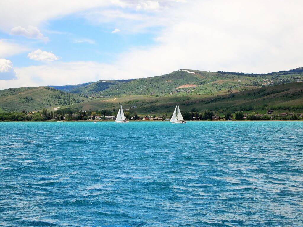 Two sailboats on a lake Bear Lake Idaho.