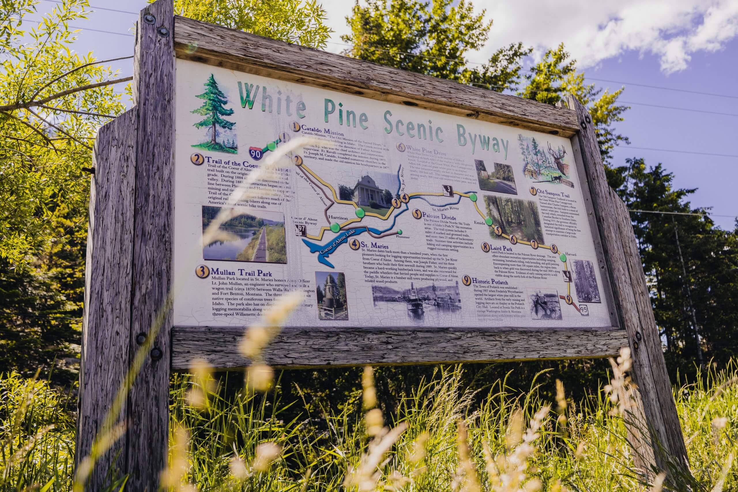 A White Pine Scenic Byway sign with a map and information.