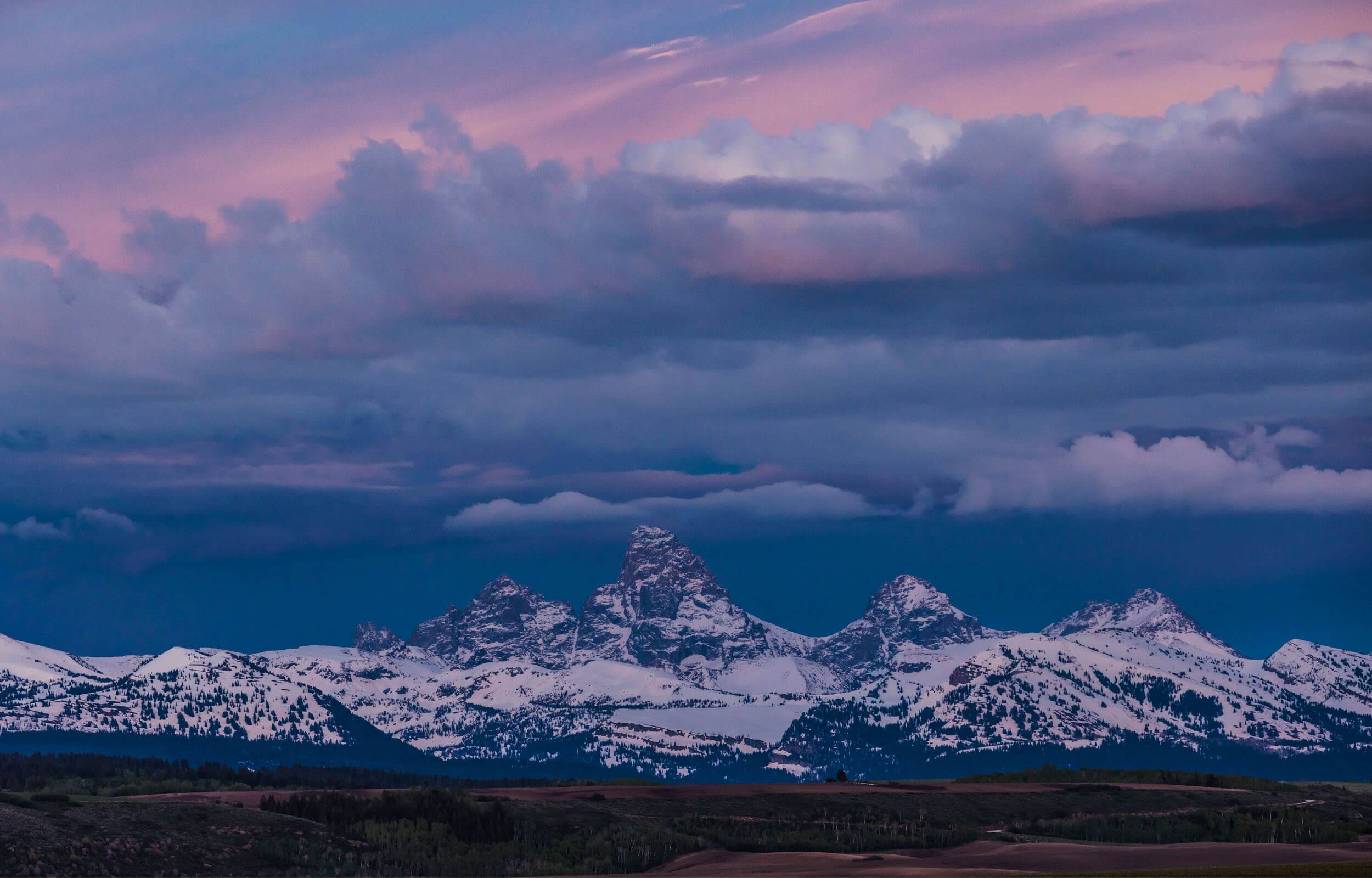 View of the Teton Mountains at sunset.