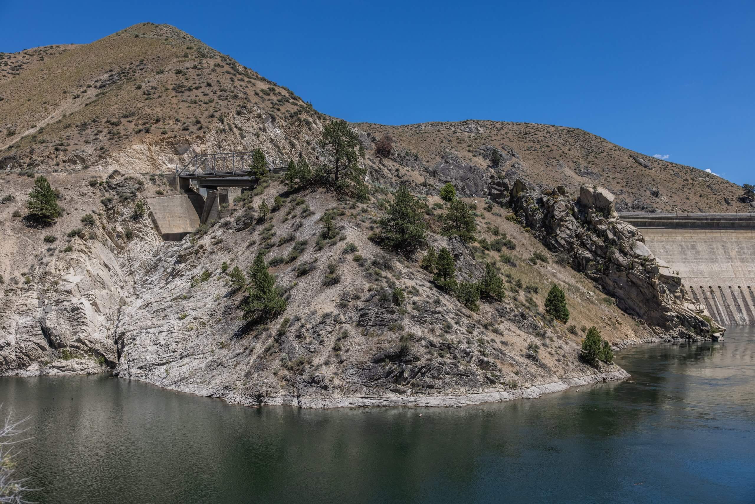 view of Arrowrock Dam and Reservoir, surrounded by mountains