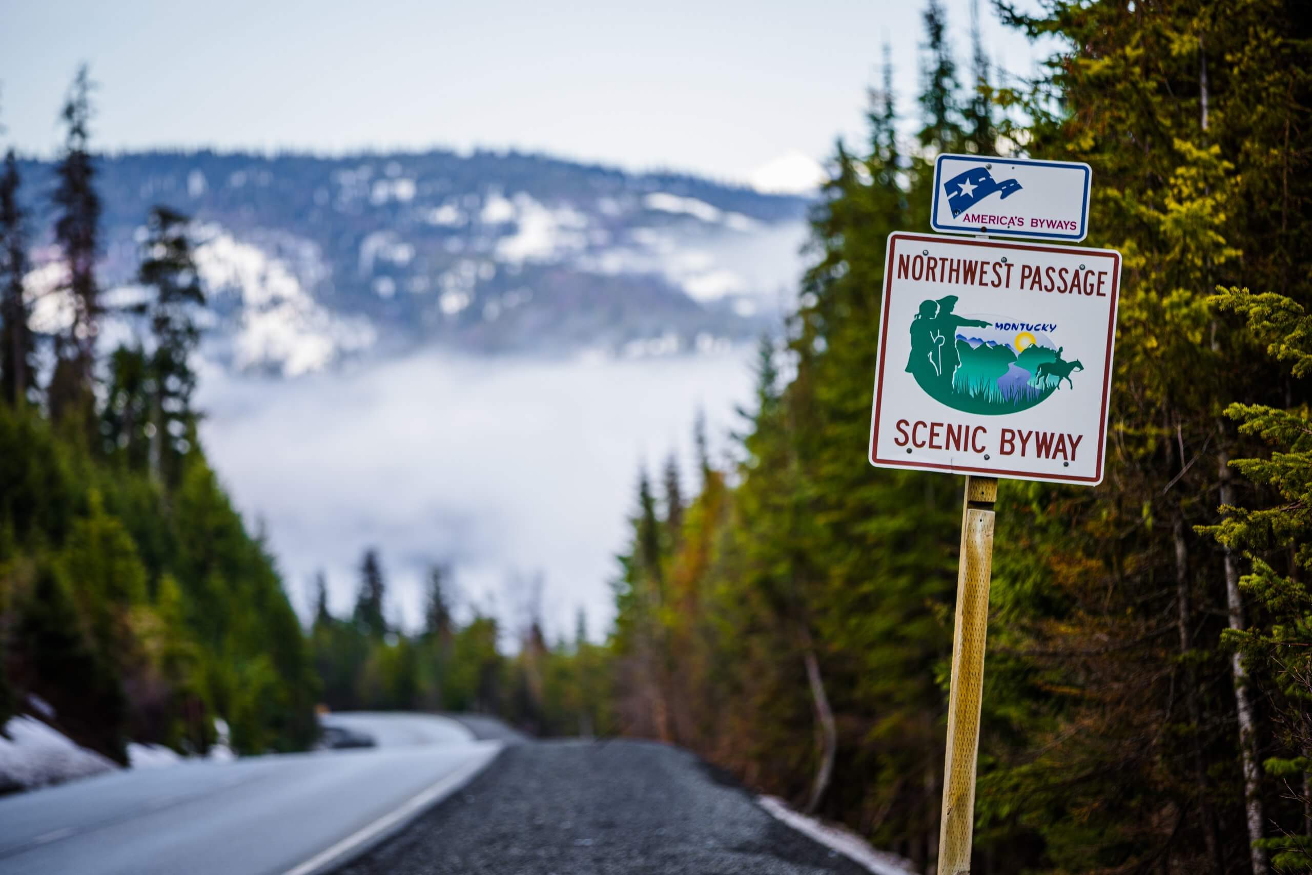 A roadside sign for Northwest Passage Scenic Byway.