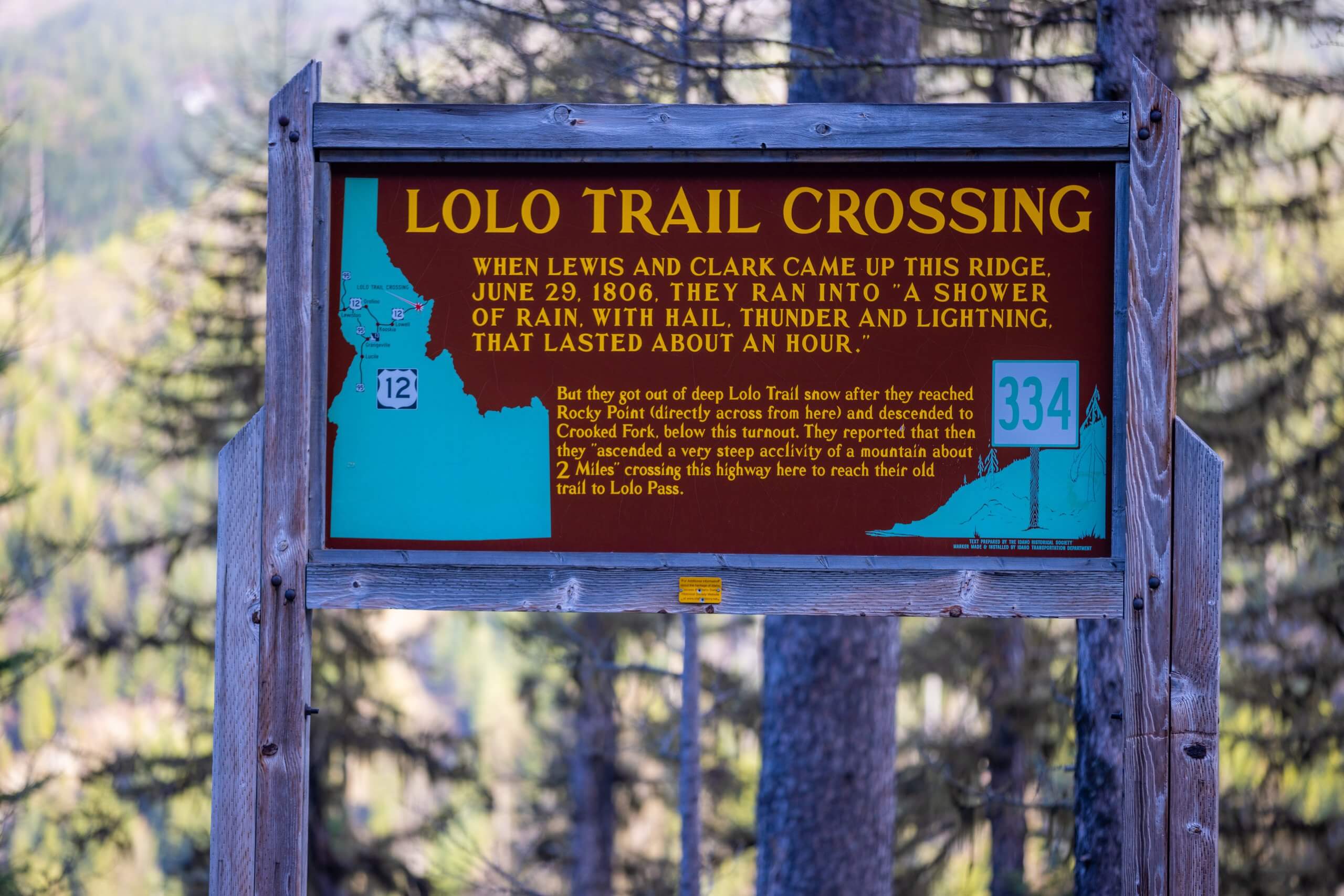 A roadside sign for Lolo Trail Crossing.