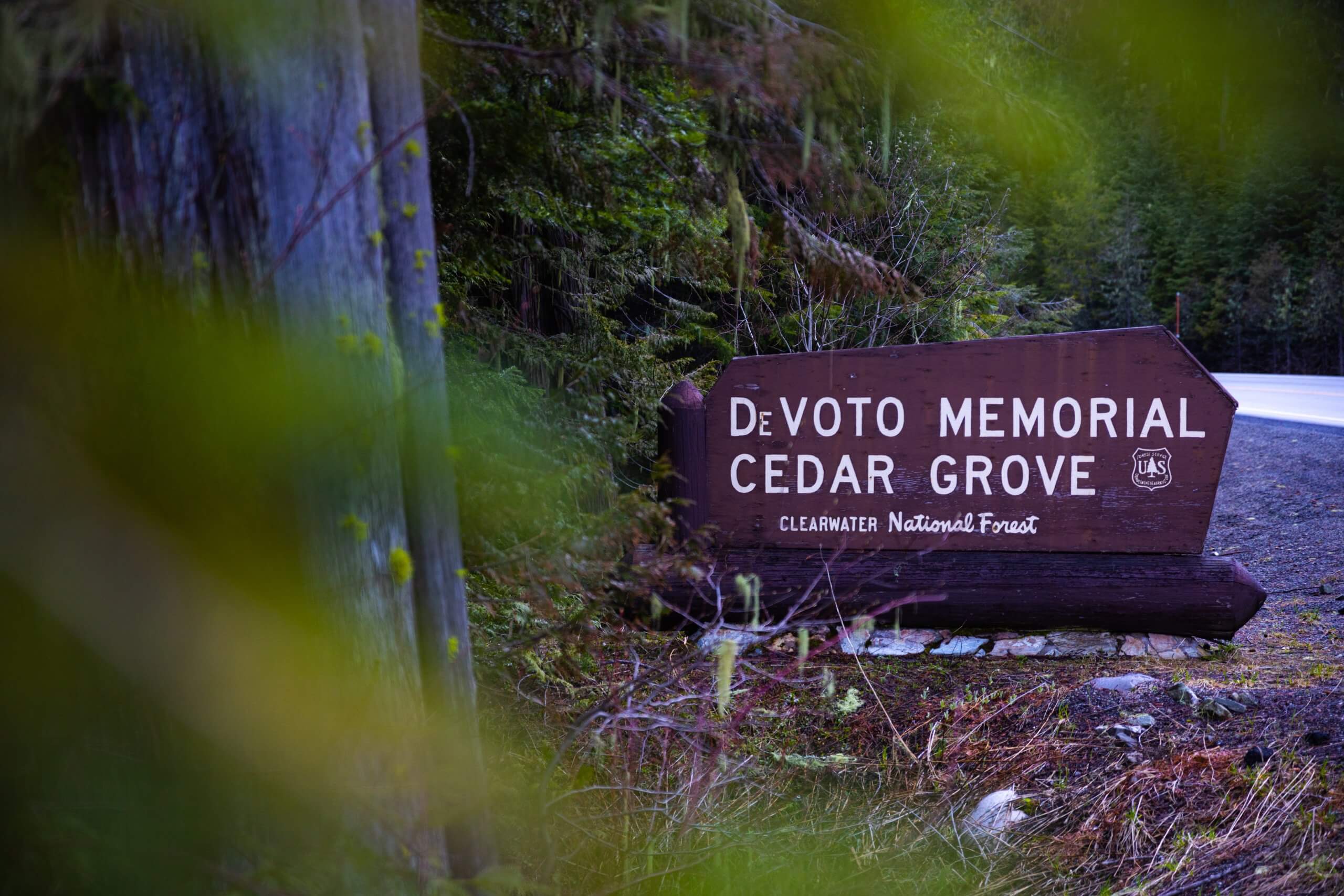 Roadside sign for Devoto Memorial Cedar Grove in the Clearwater National Forest.