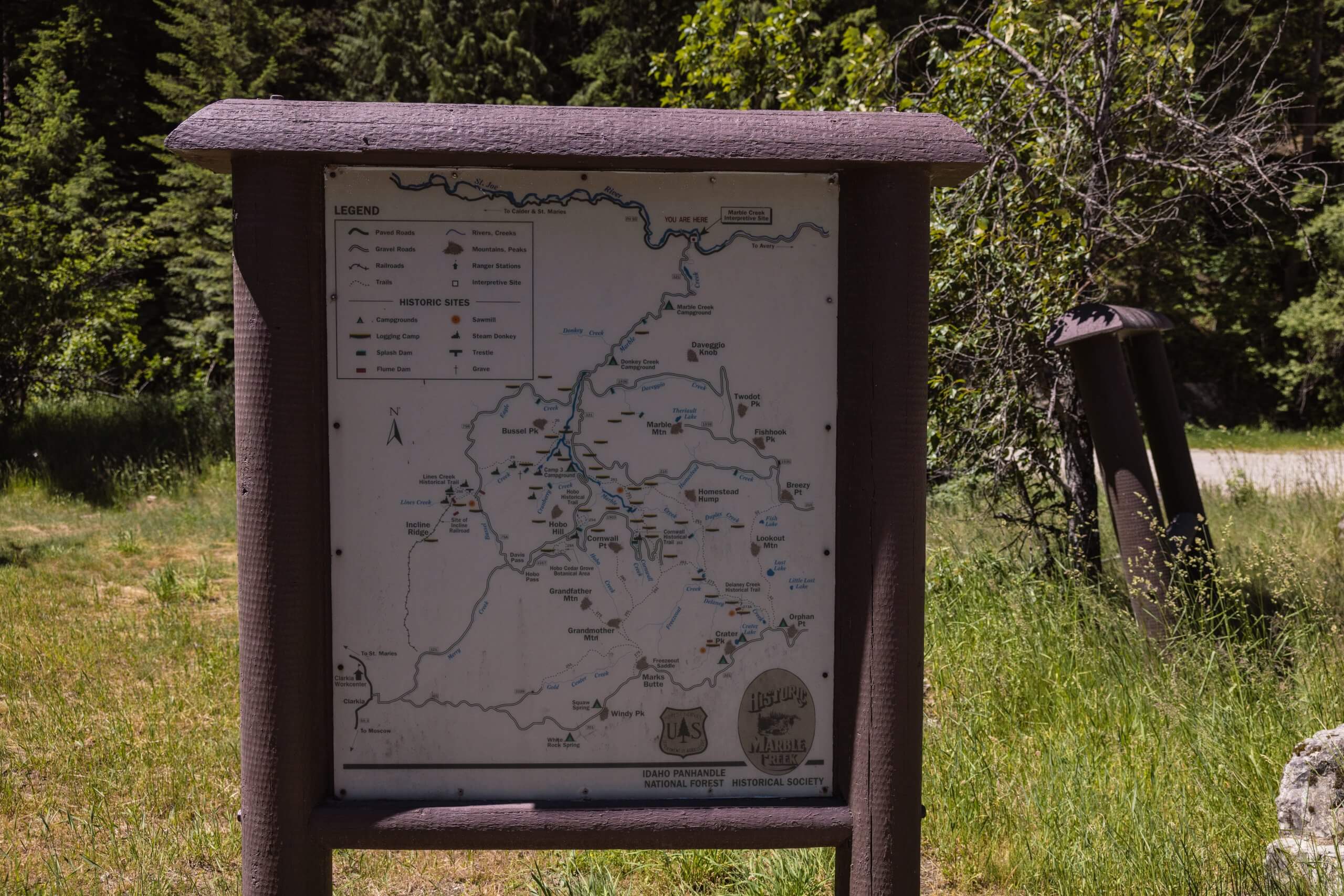 A sign with a map at Marble Creek Historical Park.