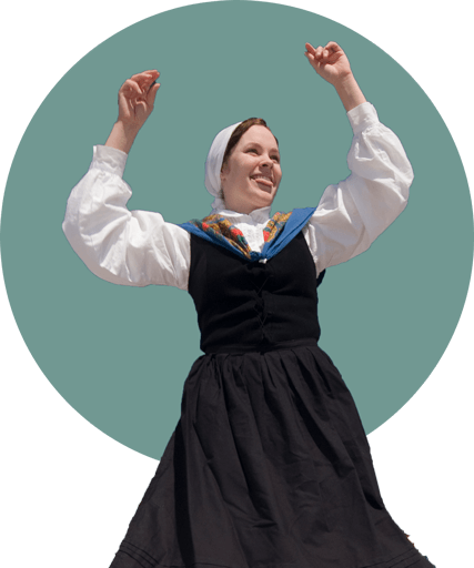 A woman dancing in a traditional Basque outfit.