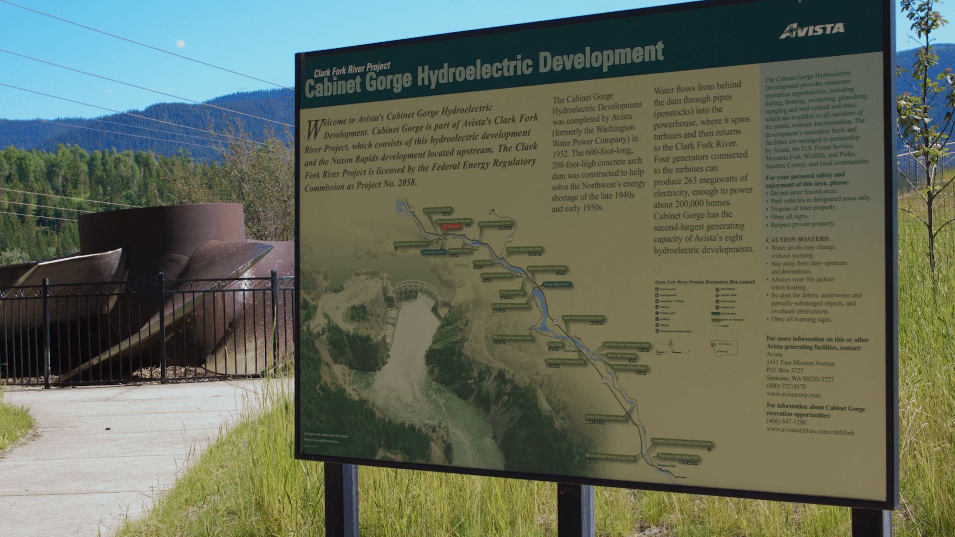 An informational sign for Cabinet Gorge Dam.